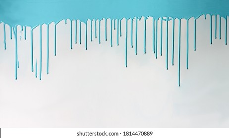 Blue Paint Dripping On White Wall