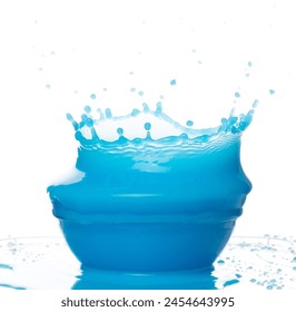 Blue paint water spill splash in bowl cup. Blue liquid lotion moisturizer cosmetic pour float in mid air. Blue cocktail drink explosion throw fluttering. White background isolated high speed shutter - Powered by Shutterstock