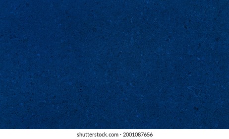 blue painted concrete texture with shadow and grain elements use for background. blank dark blue texture background, abstract concrete stone material.