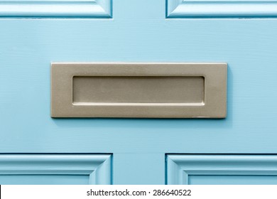 Blue Painted Door Letterbox Conceptual Image Closeup