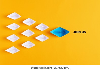 Blue Paper Boat Leads White Paper Ships With The Meaage Join Us. Job Vacancy Or Community Membership Announcement Concept. 