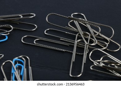 Blue paperclip individual . Seperated blue paperclip with silver paperclip