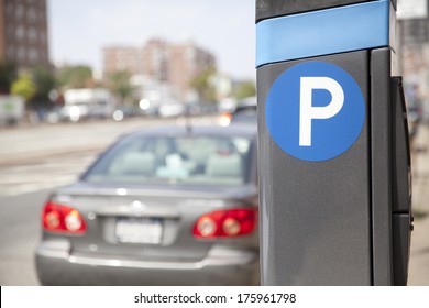 Blue Parking Sign With Blurred Cars In New York City