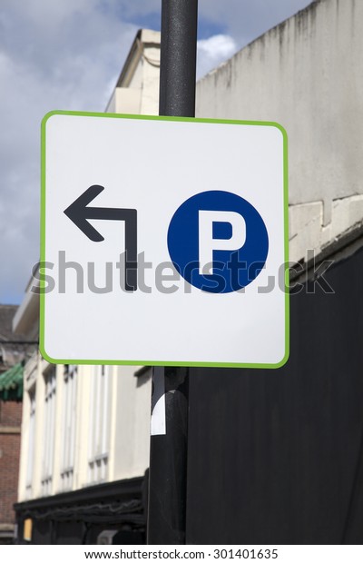 Blue Parking Sign in Urban\
Setting