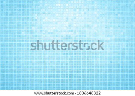 Blue pastel ceramic wall and floor tiles abstract background. Design geometric mosaic texture decoration of the bedroom. Simple seamless pattern for backdrop advertising banner poster or web. 