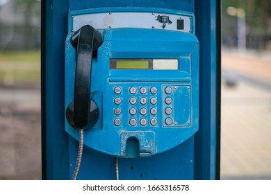 Blue Payphone On A City Street