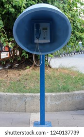 Blue Payphone On The Street