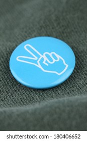 Blue Peace Pin On Shirt