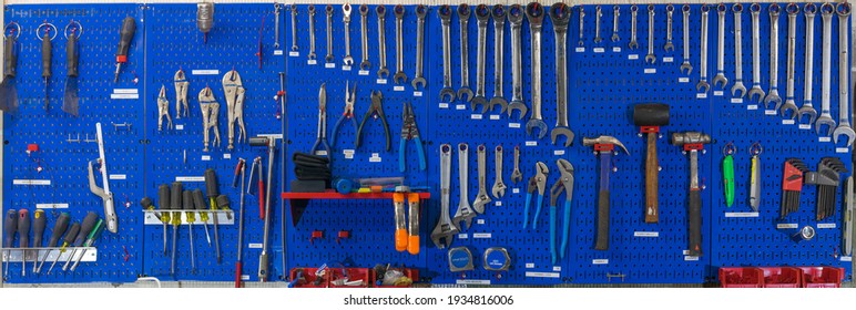 Blue Pegboard Tools Wall With Variety Tools 