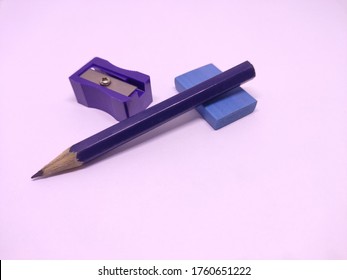 blue pencil with sharpner and eraser isolated in white background