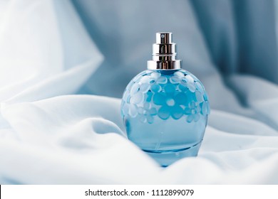 Blue Perfume On Light Background