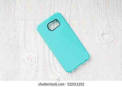 Blue Phone Case On Rustic Wooden Background And Space For Text