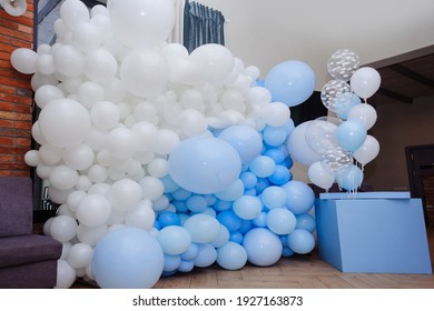 Blue photo zone with balloons on birthday party