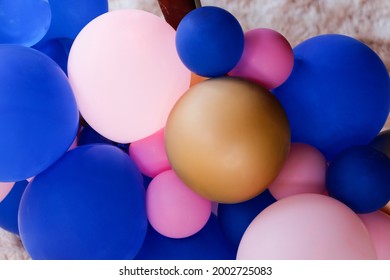 Blue and pink balls at revelation tea party - baby gender reveal party concept - Shutterstock ID 2002725083