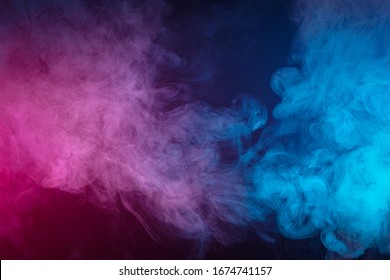 Blue And Pink Bomb Smoke On Black Isolated  Background
