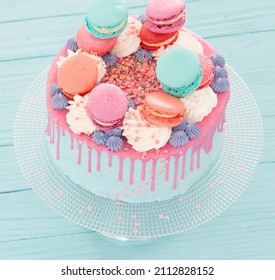 Blue And Pink Cake On Blue Wooden Backgound