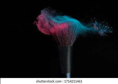 Blue And Pink Makeup On A Powder Brush Hit In A Mixed Cloud