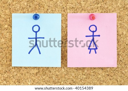 blue and pink paper in a corkboard
