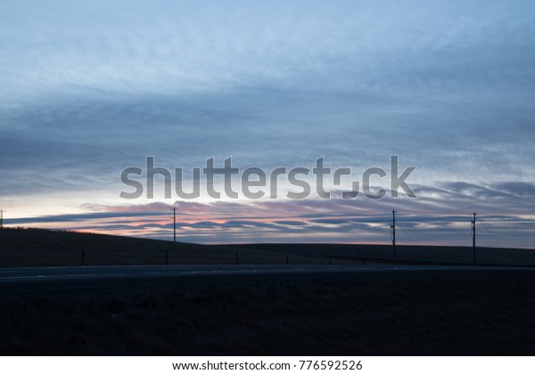 Blue and Pink Prairie\
Skies at Dusk