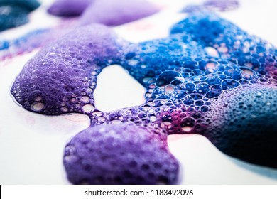 Blue, Pink And Purple Bubbles Coming Together To Form A Network Of Colorful Bubble Shapes.