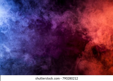 Blue, Pink, Purple Vape Smoke On Black Isolated Background
