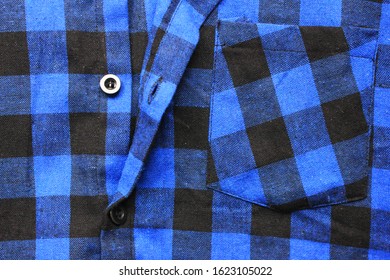 Blue Plaid Shirt Close Up View Of Casual Blue & Black Color Unbuttoned Top. Flannel Shirt With Front Pocket, Stylish Lumberjack Clothes, Tartan Pattern Design 