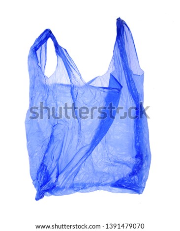 Blue plastic bag on white background. Isolated object