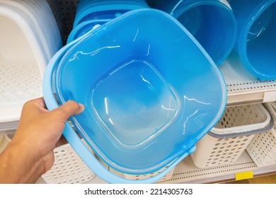 Blue Plastic Bucket In A Shopping Mall.