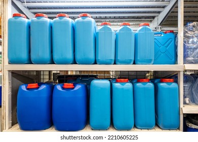 Blue Plastic Gallon Bucket In A Home Supply Store.