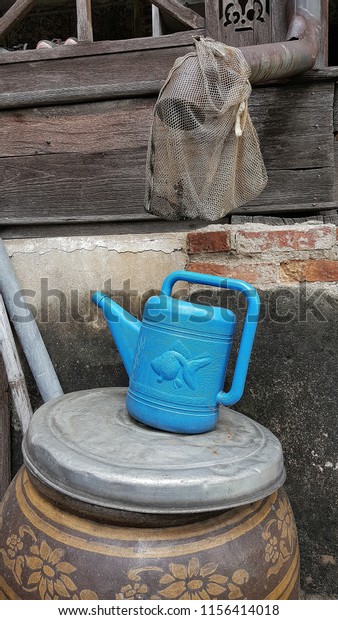 Featured image of post Blue Plastic Watering Can / Blue can water is then sterilized.