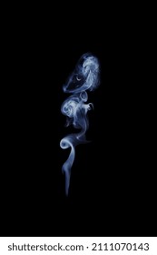 Blue Plume Of Smoke Isolated On Black Background