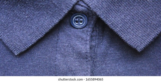 Blue Polo Shirt Close Up Background. Classic Style Plain Tee, Dark Color Buttoned Polo Shirt Top View. Stylish Casual Short Sleeve Shirt With Button-up Collar Neck