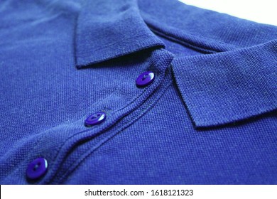 Blue Polo Shirt Close Up View Of Casual Buttoned Cotton Top. Minimalist Polo Shirt Design, Simple Short Sleeve Tee Front. Men And Women Stylish Blue Top, Low Angle View 