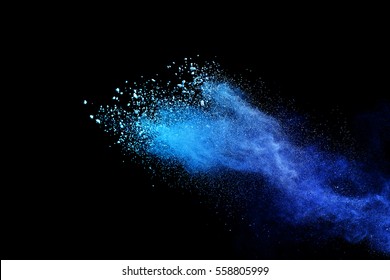 Blue Powder Explosion On Black Background. Colored Cloud. Colorful Dust Explode. Paint Holi.