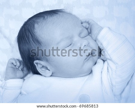 Similar – Newborn lying on bed embraced by her mother