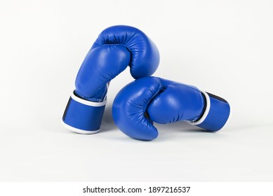 Blue Professional Boxing Gloves On A Light Background Lie On Top Of Each Other - Winner And Loser, Concept Of Sport, Boxing