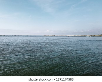 Blue Rappahannock River On A Cloudy Day