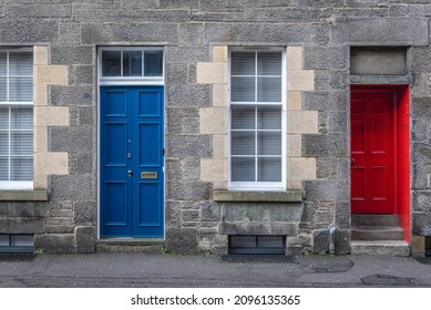 Blue And Red Door Of Tenement In Edinburgh City, UK