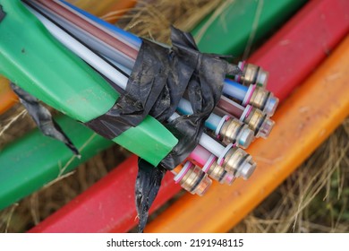 Blue, Red, Green And Orange Colored Fiber Optic Cables Laid In The Ground, Underground Cables For Faster Internet In Rural Regions, Garbsen Berenbostel, Lower Saxony, Germany.