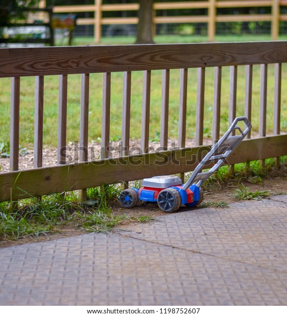 wooden lawn mower push toy