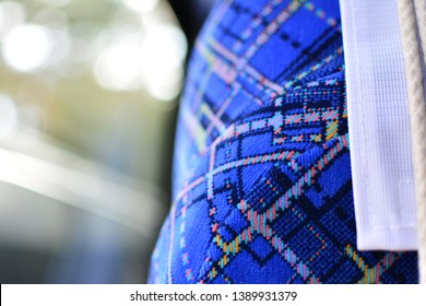 Blue With Red Purple Yellow Black Line Square Pattern Of A Seat Fabric Cover In Tourist Bus