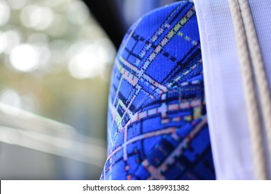 Blue With Red Purple Yellow Black Line Square Pattern Of A Seat Fabric Cover In Tourist Bus