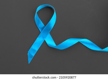 Blue Ribbon On Black Background Prostate Cancer Awareness Concept