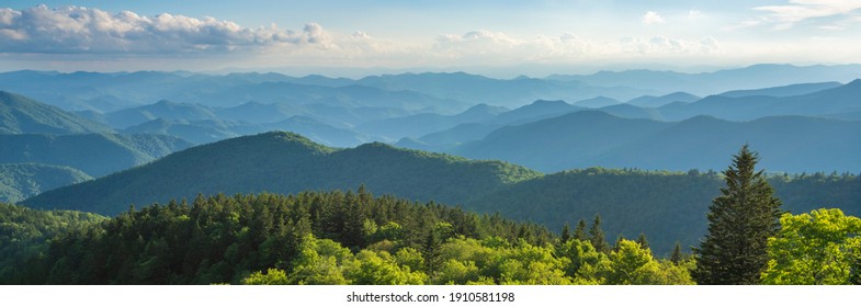 Blue Ridge Parkway summer Landscape. Beautiful mountain panorama with green mountains and layers of  hills. Near Asheville, North Carolina. Image for web header or banner.