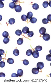 Blue Ripe Grape Berries, Seamless Photographic Pattern, Top View, Isolated On White Background. Overhead Shot. Structure Of Blue Heap Of Ripe Berries. Layout Of Grape Pieces. Wine Berries Texture.