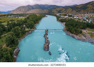 Blue river Katun in Altay, Siberia Russia. Landscape popular tourist place Dragon Teeth and suspension bridge. - Shutterstock ID 2273400151