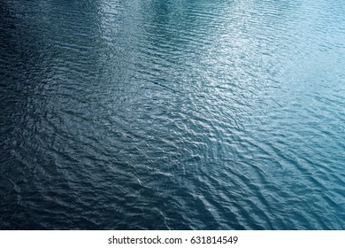 Blue River Water Surface, Aerial View From The Bridge