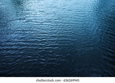 Blue River Water Surface, Aerial View From The Bridge