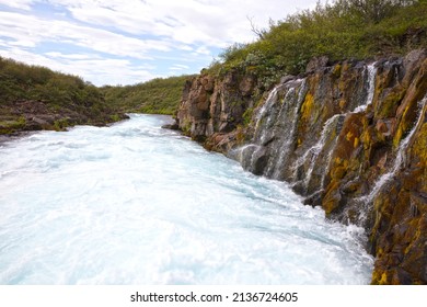 Blue river waterfall in Iceland, downstream the Bruarfoss