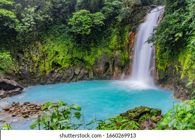 Blue River Waterfall In Tropical Forest